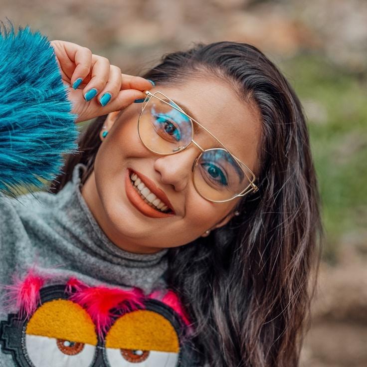 Anaya Sharma, Lead Design Curator at Ridge Harbor Murmur, reviewing corporate floral arrangements